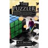 The Puzzler: One Man's Quest to Solve the Most Baffling Puzzles Ever, from Crosswords to Jigsaws to the Meaning of Life (Library Binding)